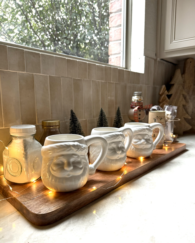 A cheerful Santa mug with a playful design, ideal for adding a touch of whimsy to your holiday cocoa bar.